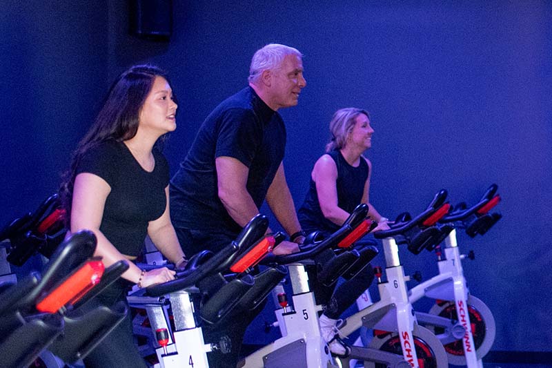 A full FitMix cycling class riding in sync